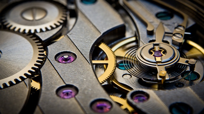 Close-up of a mechanical watch movement with gears