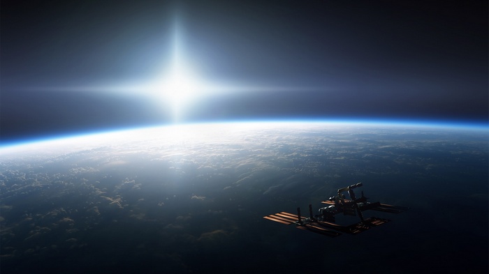 Space station orbiting Earth with bright sun