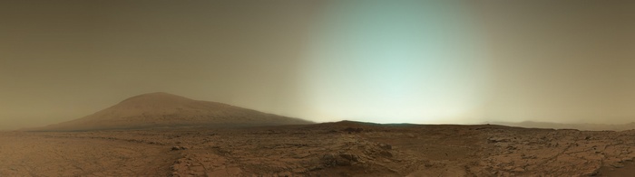 Mars landscape with a mountain and a bright sky