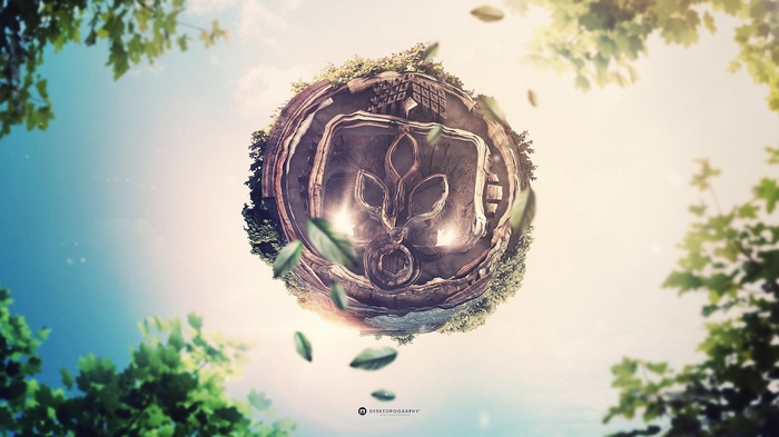 Desktopography logo on a floating planet with leaves