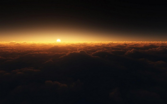 Sunset over a sea of clouds