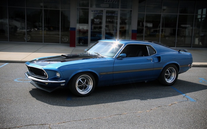 Blue 1969 Ford Mustang Mach 1 parked