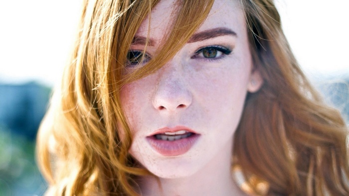 Hattie Watson with red hair and freckles