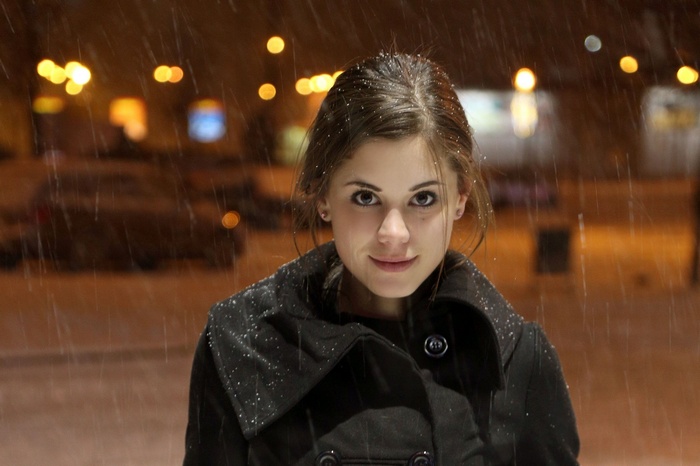 Markéta Stroblová in a black coat during snowfall