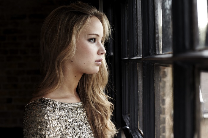 Jennifer Lawrence looking out a window