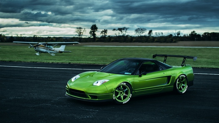 Green Honda NSX with Airplane on Tarmac