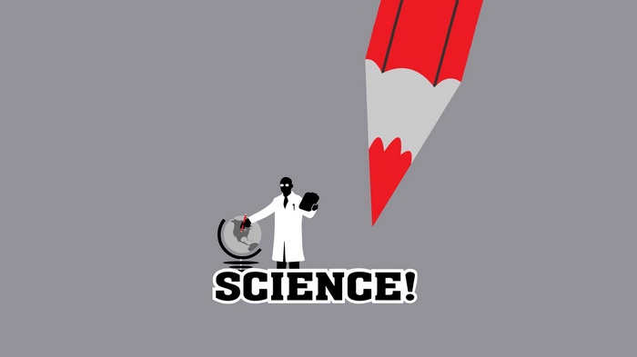 Scientist drawing on a globe with a large pencil