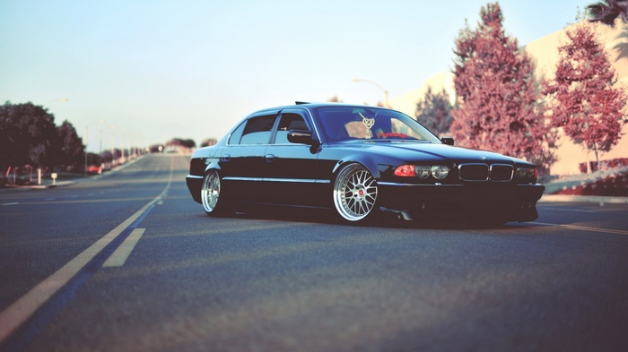Black BMW E38 750il on a road