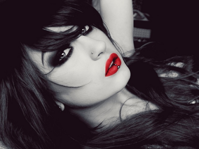 Niky Von Macabre with red lipstick and lip piercing