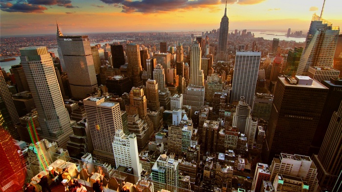 New York City cityscape with Empire State Building at sunset