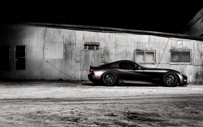 Black Dodge Viper parked at night