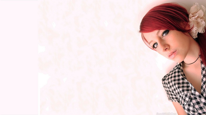 Sofia Wilhelmina with red hair and checkered shirt