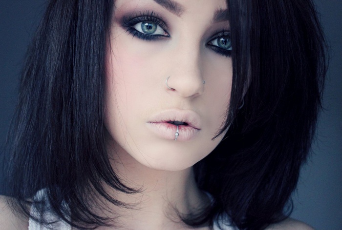 Portrait of Niky Von Macabre with piercings