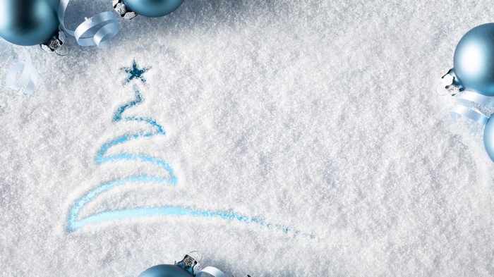 Blue Christmas ornaments and a drawn Christmas tree in snow