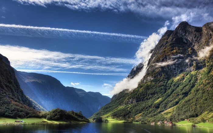 Mountains and lake landscape with clouds