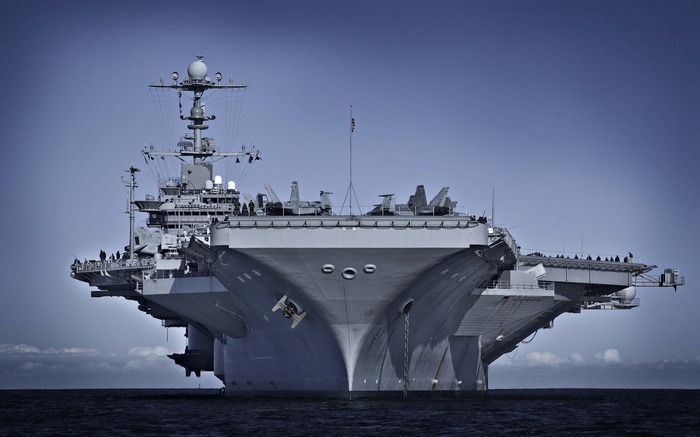 Military aircraft carrier at sea