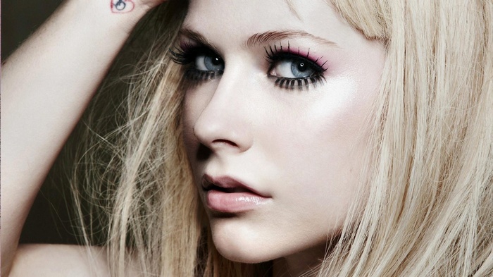 Avril Lavigne close-up portrait with dramatic makeup