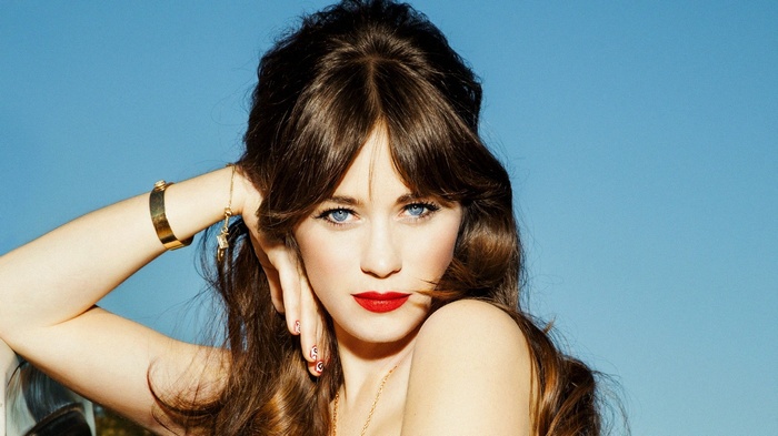 Zooey Deschanel with blue eyes and red lipstick