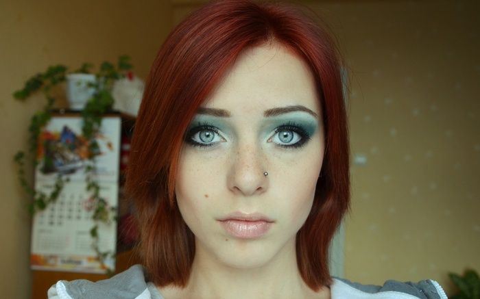 Lana Branishti with red hair and blue eyes