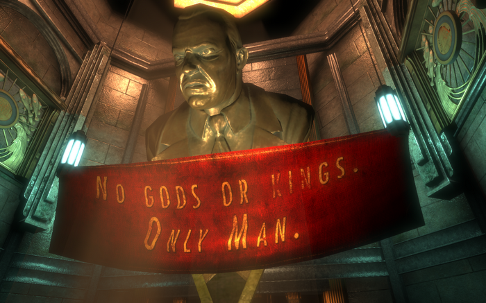 Statue with "No Gods or Kings. Only Man." banner