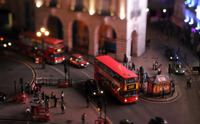 London street scene with double-decker buses and taxis