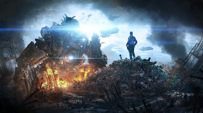 Titanfall pilot stands on debris next to a damaged Titan
