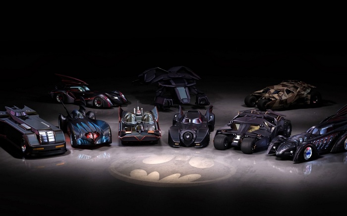 Collection of Batmobiles on a Bat Signal projection