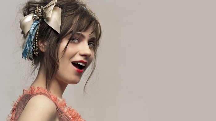 Zooey Deschanel with a bow in her hair