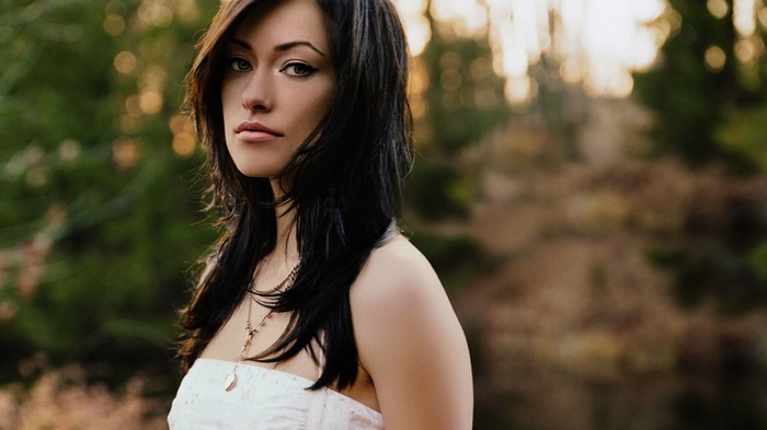 Olivia Wilde in a white dress with a necklace