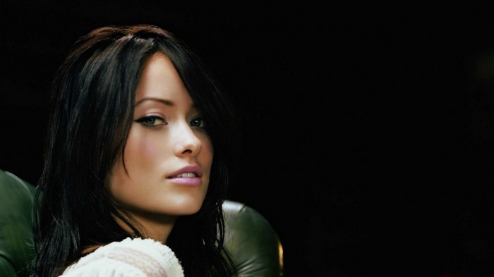 Olivia Wilde looking over her shoulder