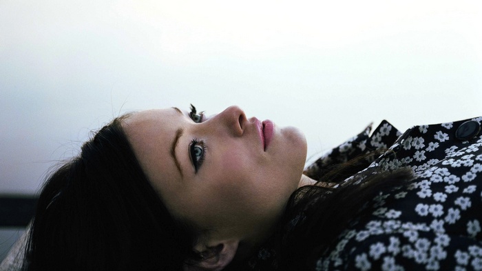 Olivia Wilde lying down looking up