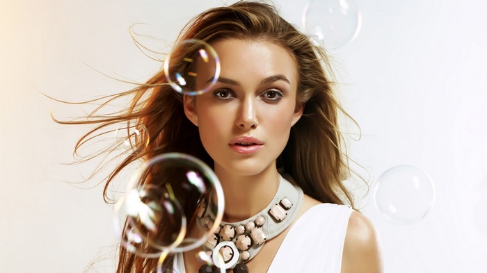 Keira Knightley with bubbles and necklace
