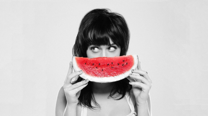 Katy Perry holding a slice of watermelon