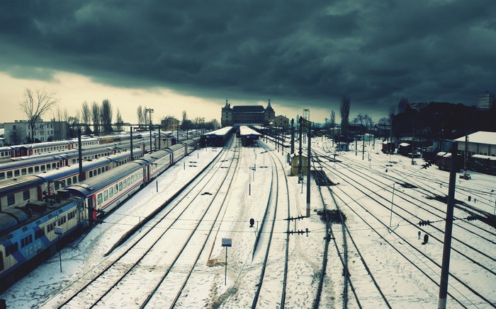 Haydarpaşa Train Station in Istanbul covered in snow under a dark sky