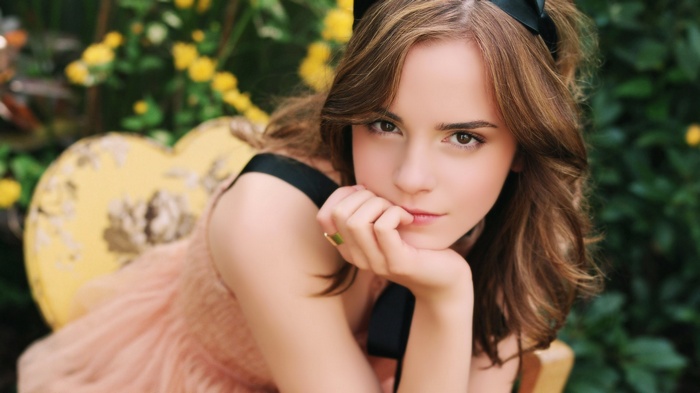 Emma Watson portrait with yellow flowers