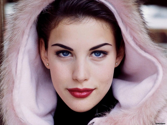 Liv Tyler wearing a pink fur hood