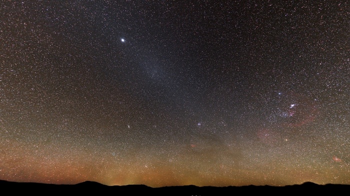 Night sky filled with stars and nebulae