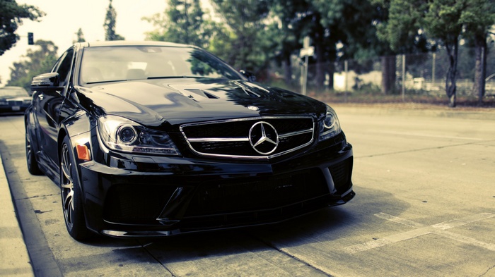 Black Mercedes-Benz C-Class parked on a street