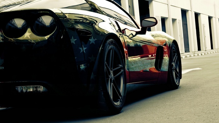 Black Chevrolet Corvette with American Flag Stars
