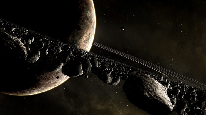 Planet with asteroid belt and rings in space