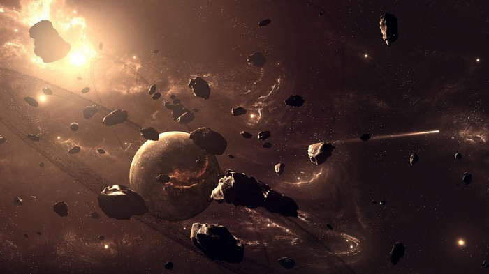Asteroid field with a ringed planet and a distant sun