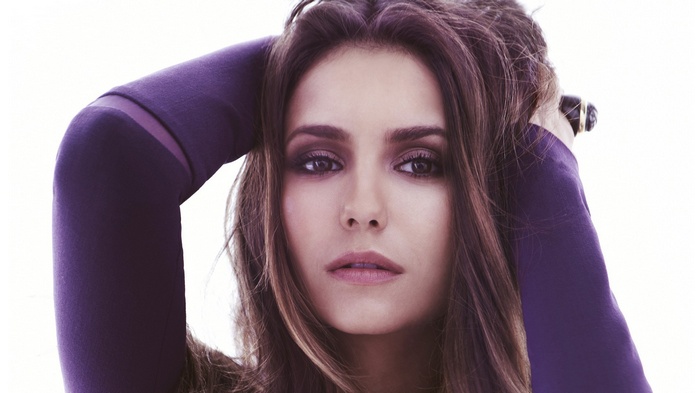 Nina Dobrev with arms up