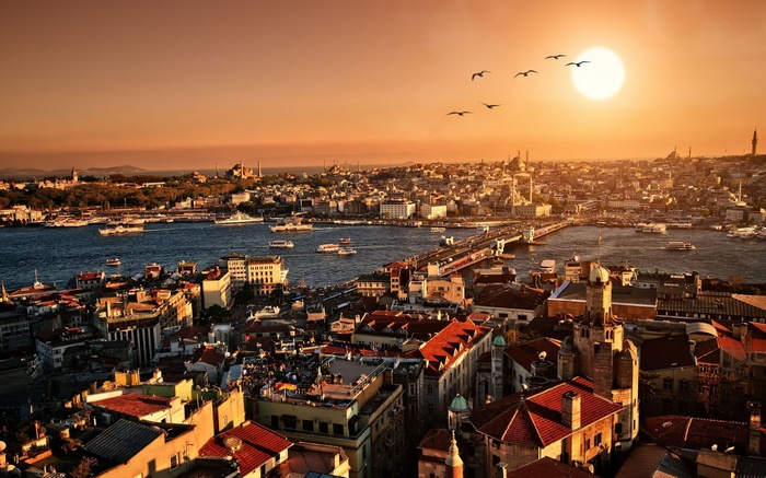 Istanbul cityscape with Golden Horn and Galata Bridge at sunset