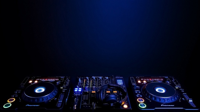 Pioneer DJ equipment with headphones on a blue background