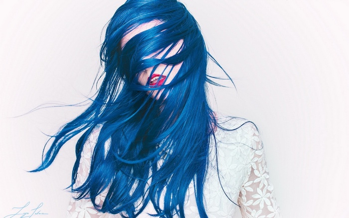 Woman with blue hair and red lipstick