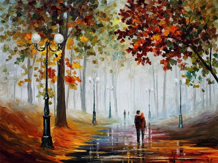 Couple walking on a path in fall with street lights