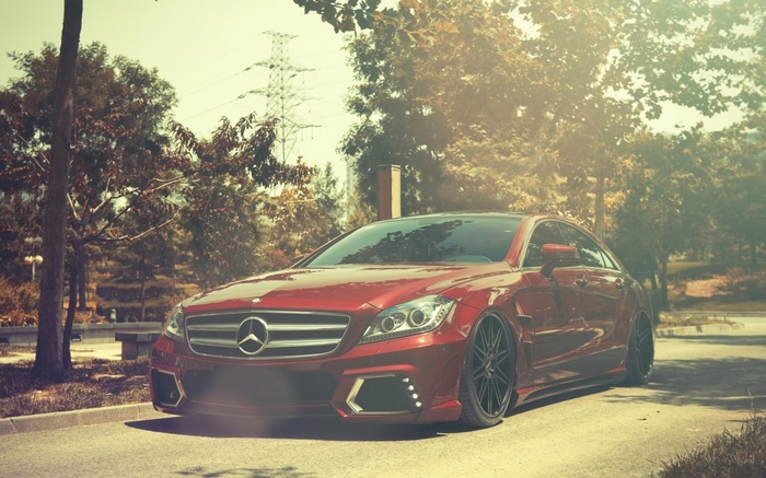 Red Mercedes-Benz CLS parked outdoors