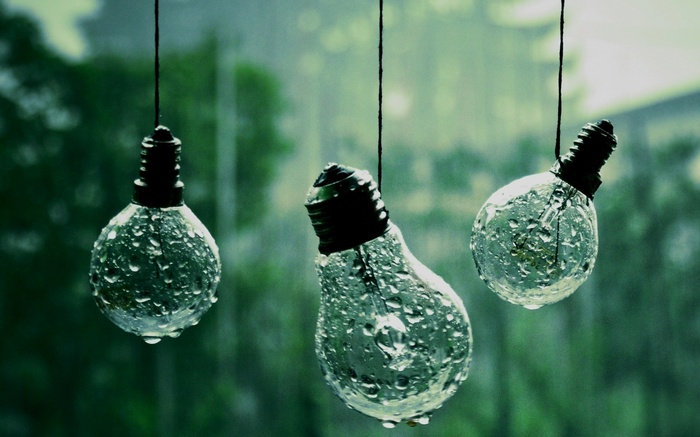 Light bulbs covered in water drops in the rain