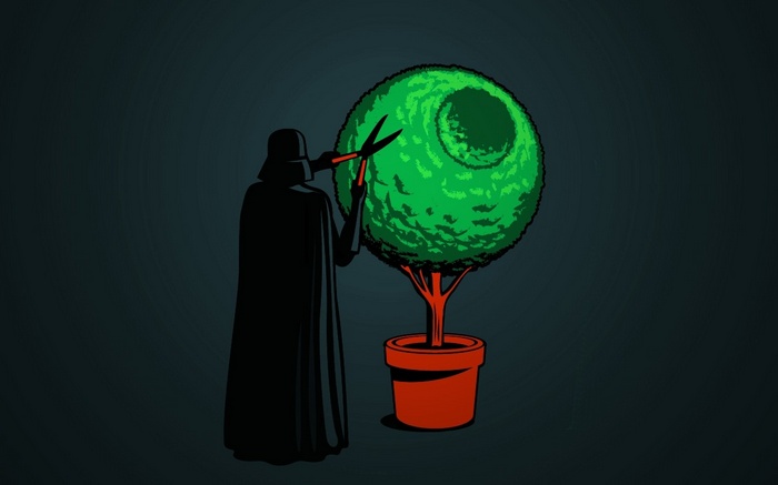 Darth Vader trims a Death Star-shaped tree