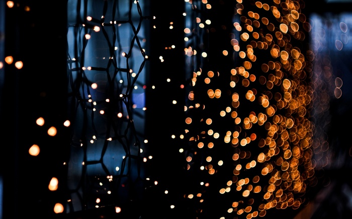 Bokeh of orange and white fairy lights